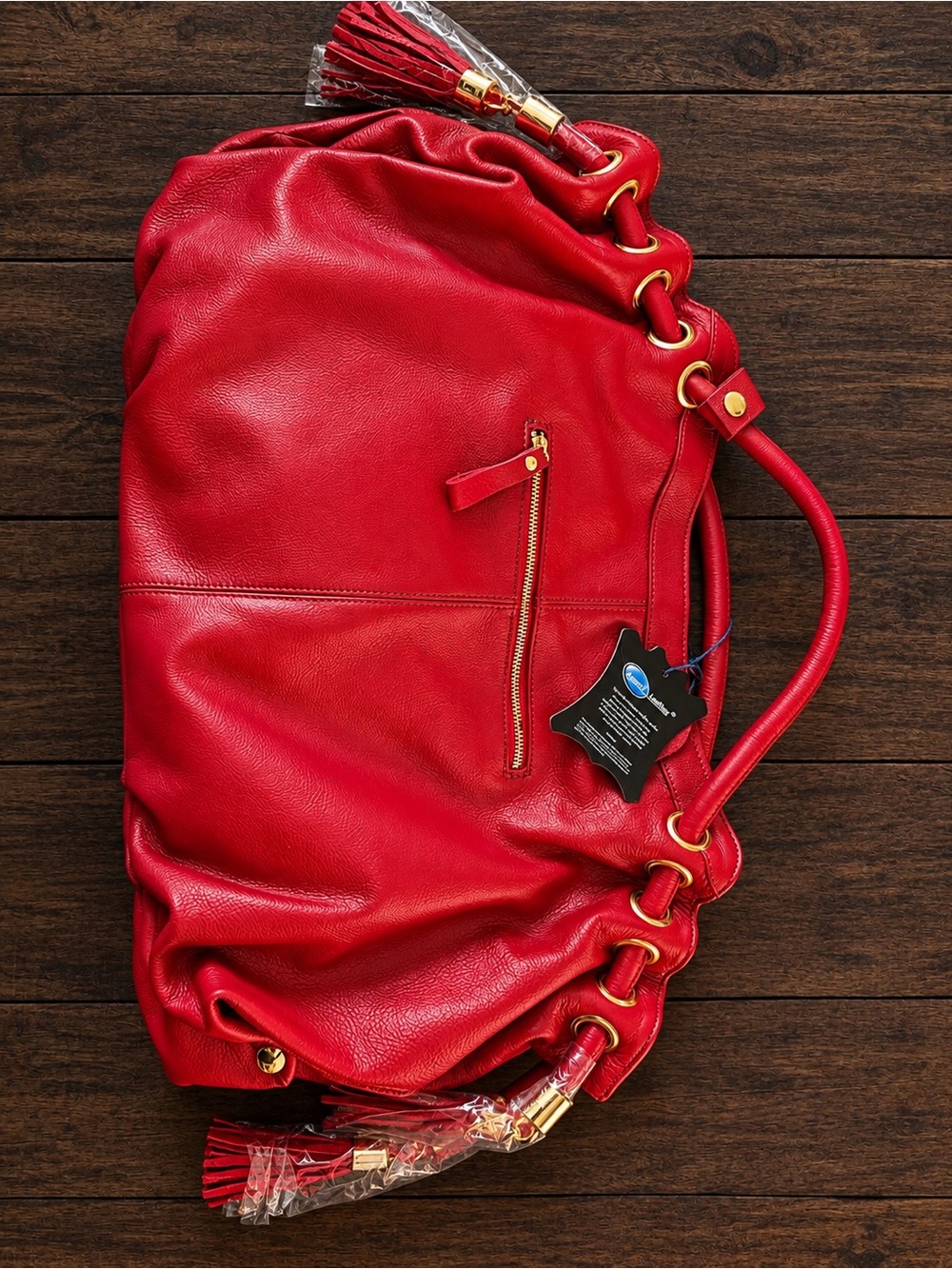 Burgundy Leather Drawstring Satchel with Tassel Accent